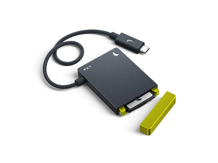 CFexpress B Card Reader PKT wit grey body and yellow cap with USB 3.2 Cable displayed on a neutral background